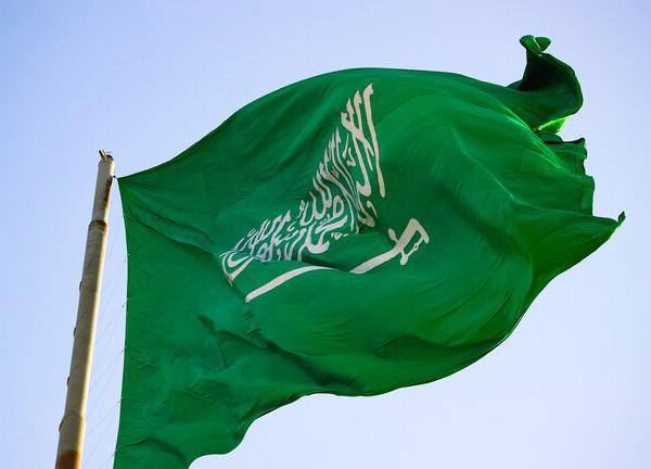 رحيل "خطاط الشهادتين والسيف" في علم السعودية 
